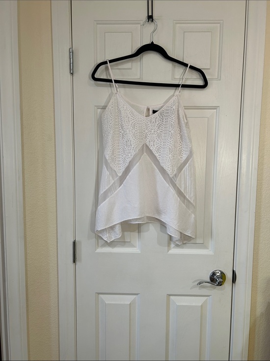 BCBGMaxAzria Tops - BCBGMaxAzria White Lace Trim Asymmetrical Lace & Mesh Panel Flowy Camisole MED